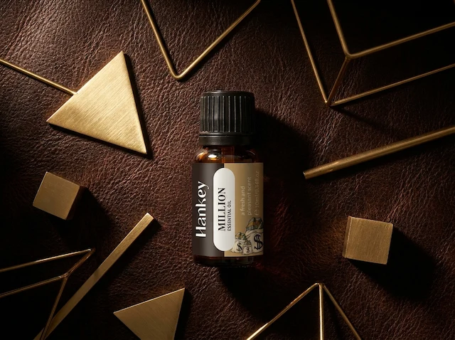 Millionaire oil bottle flat lay, luxury aesthetic